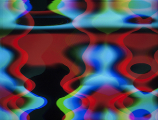 a photograph of bright colors being generated by an audio waveform