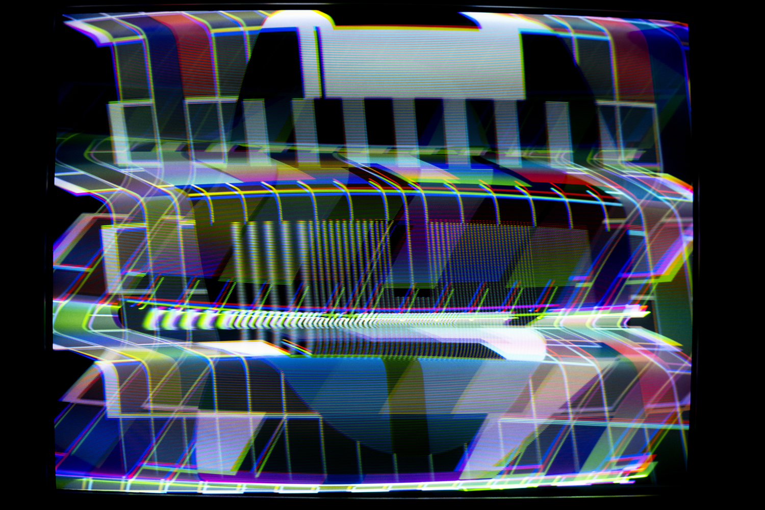 Photo of the PAL Test Card heavily manipulated electromagnetically through the CRT Flux Phaser.