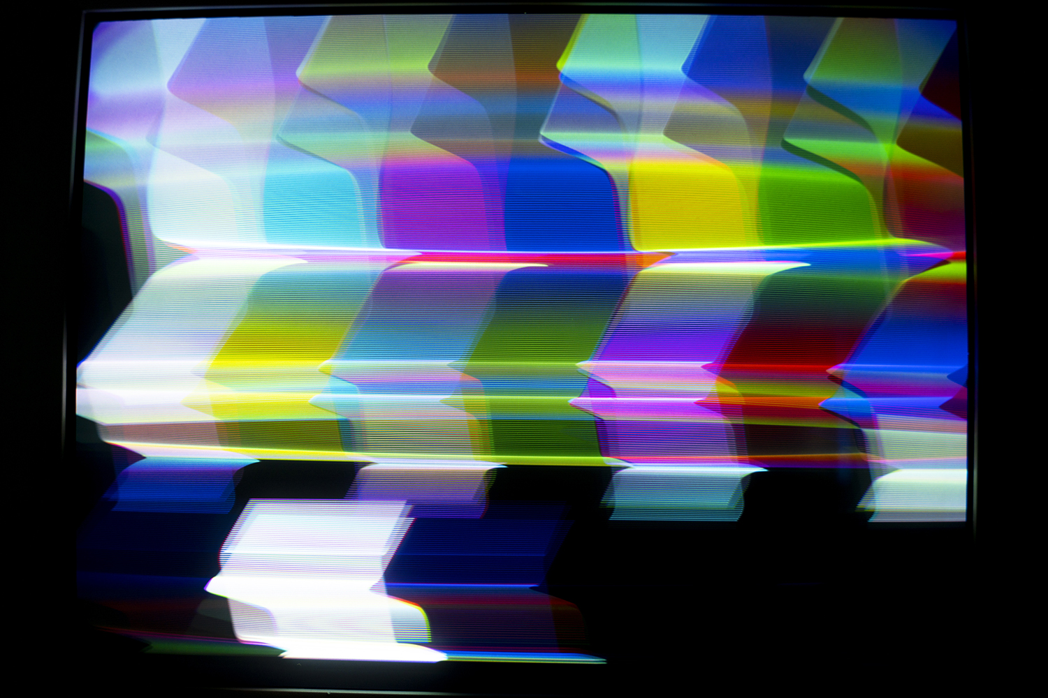 Photo of the SMPTE Test Cardd heavily manipulated electromagnetically through the CRT Flux Phaser.