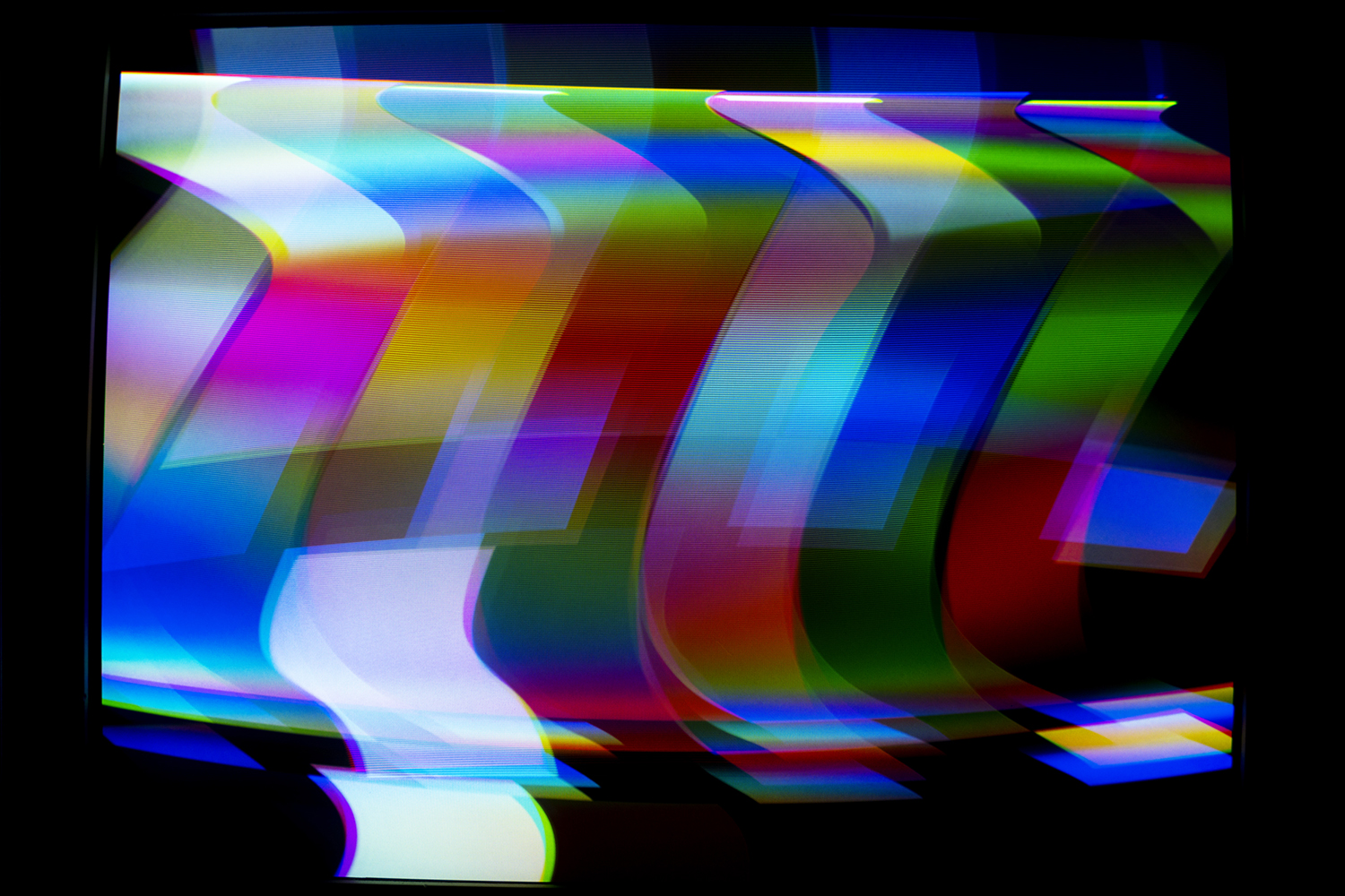 Photo of the SMPTE Test Card heavily manipulated electromagnetically through the CRT Flux Phaser.