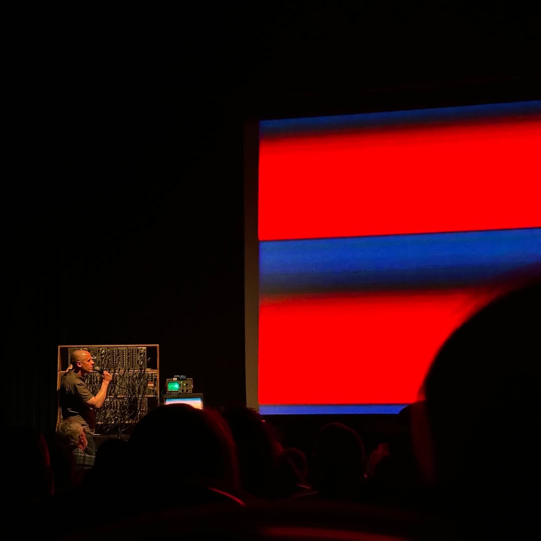 James Connolly performing with the Sandin Image Processor on stage at the Gene Siskel Film Center.